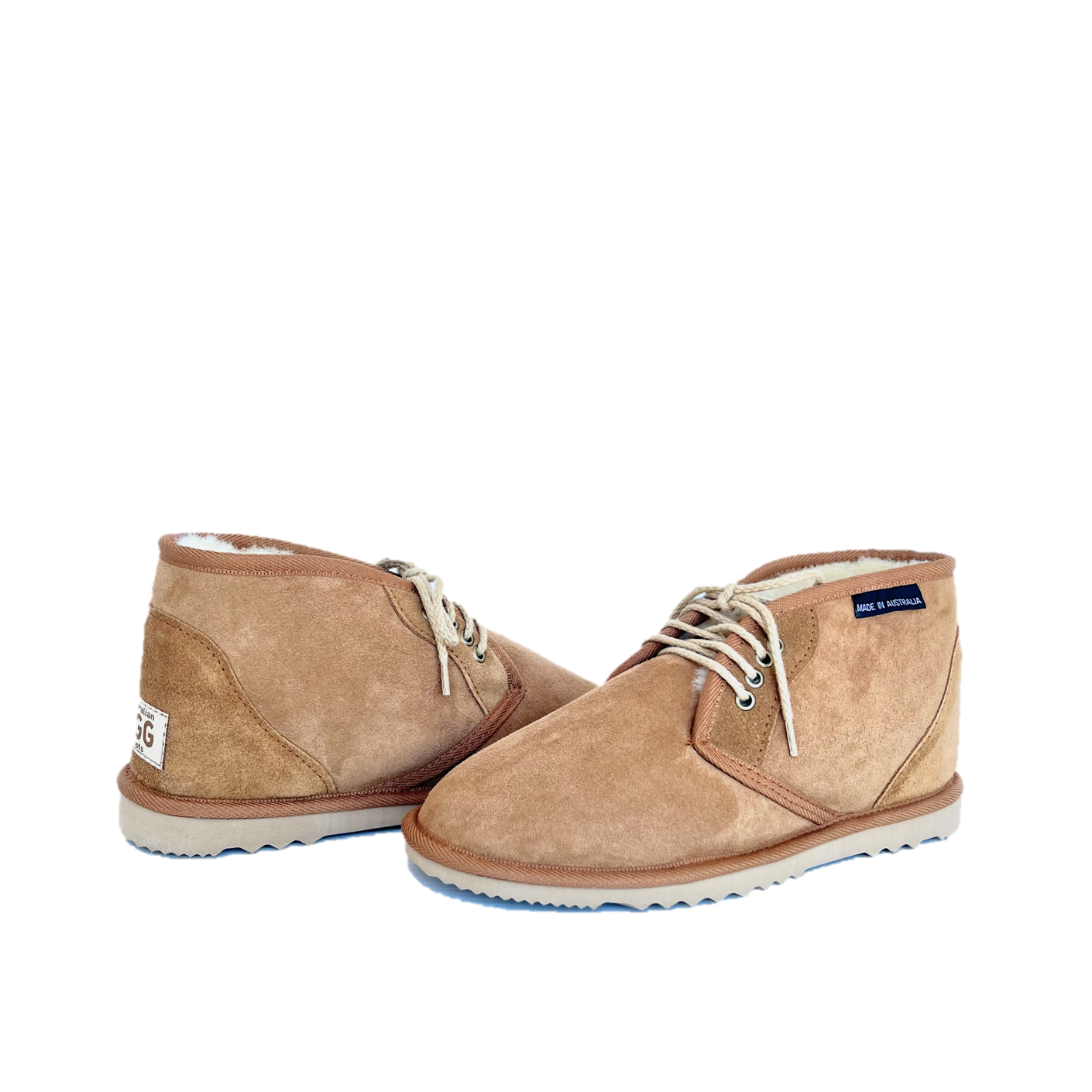 A pair of blue men's desert boots with lace-up closure and a sheepskin upper.
