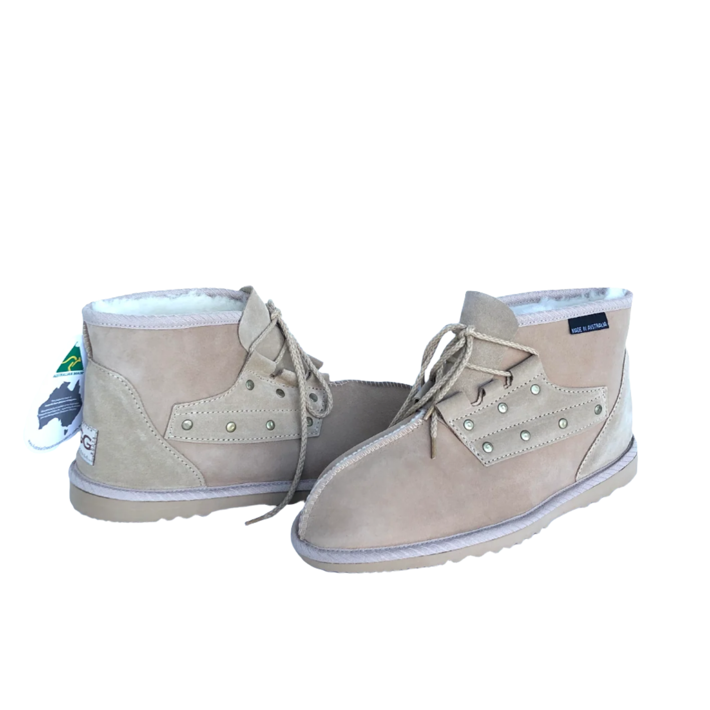 Pair of sand coloured chestnut desert boots with laces