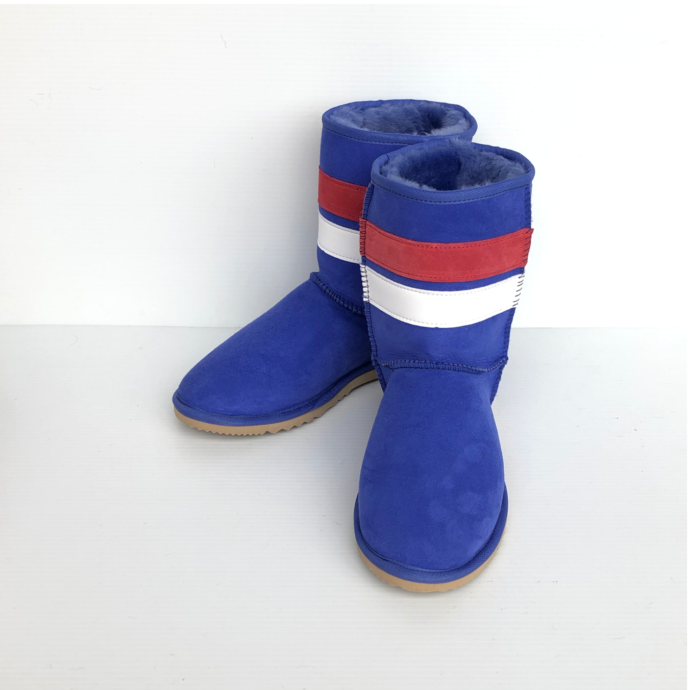 Team Ugg Boots - mainly Bright Blue with a red and white stripe across front