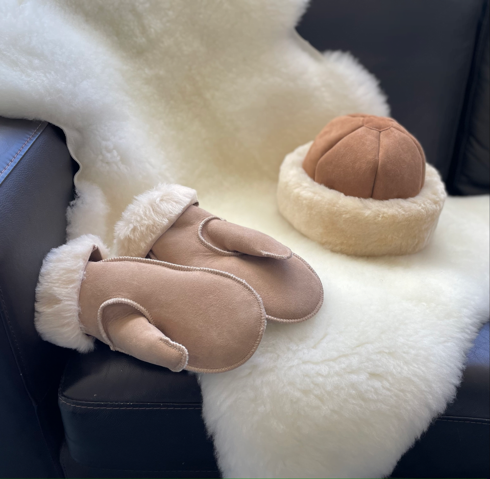 Sheepskin rug, gloves and hat
