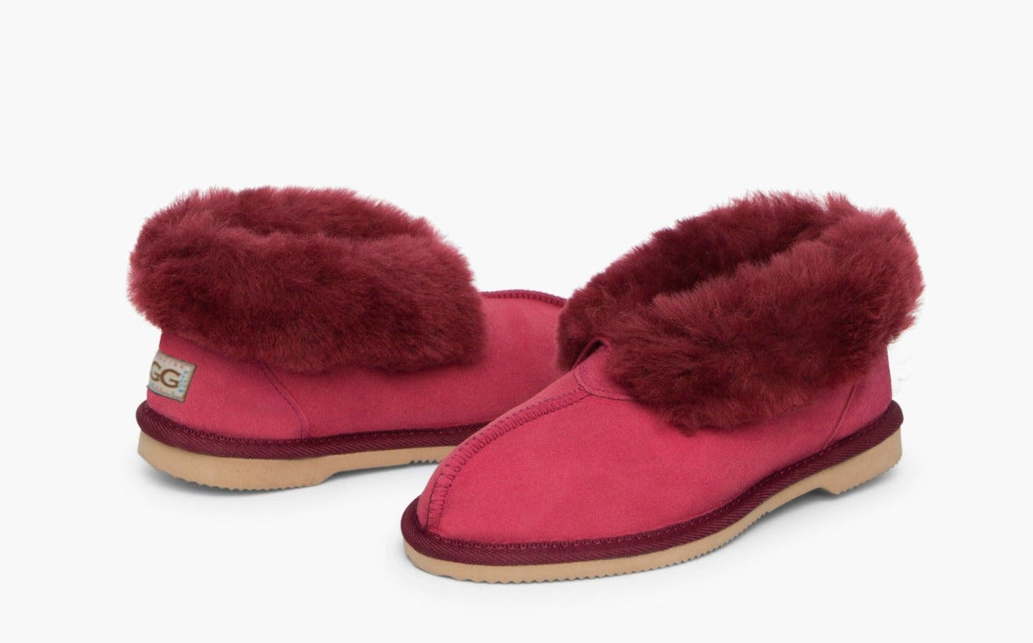 Kid's Ugg Slippers, with sheepskin rolled out at the top in Scarlet