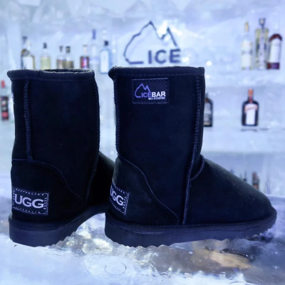 Pair of Black short ugg boots with an Melbourne IceBar co-branded label.