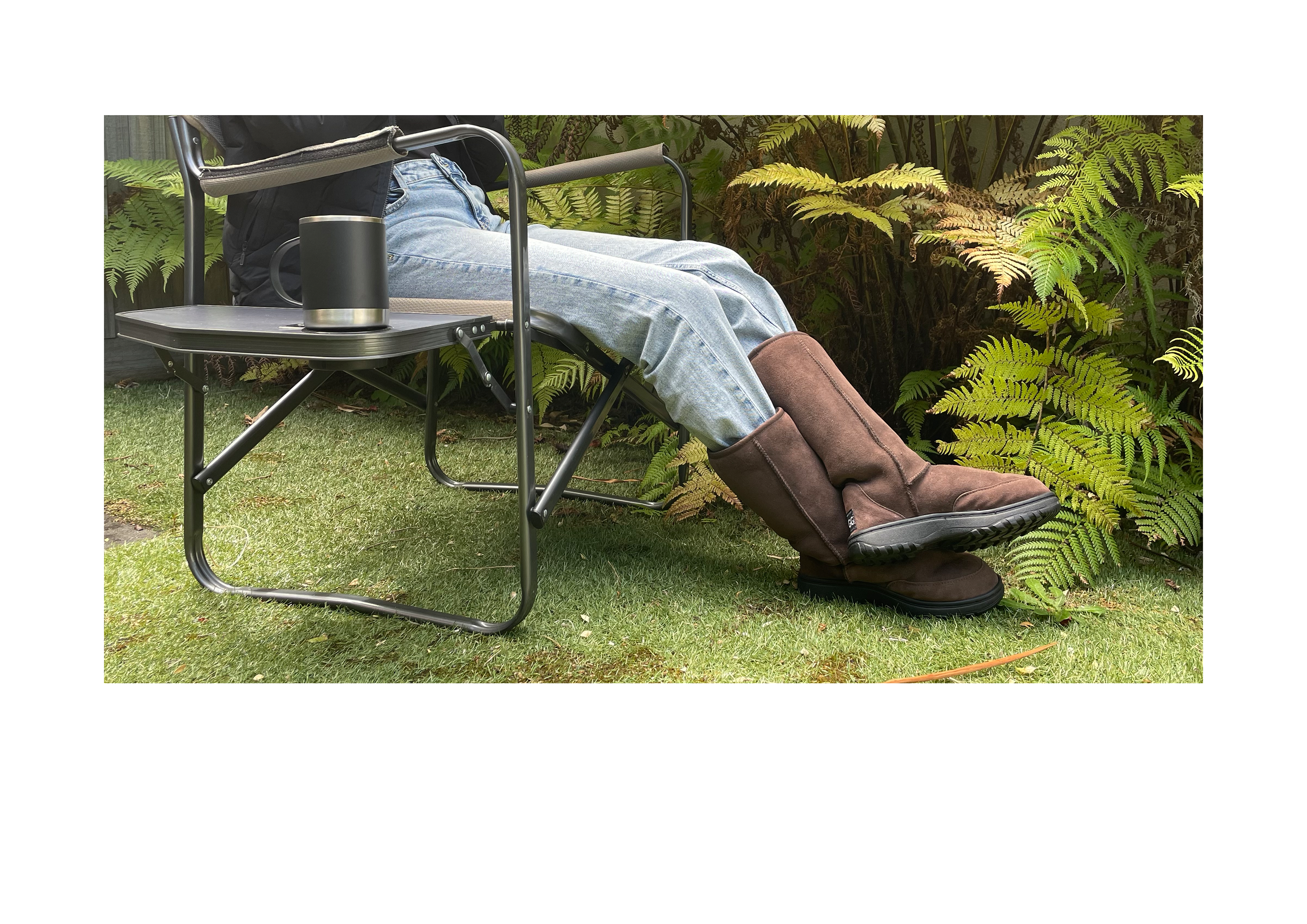 Woman sitting on camping chair wearing chocolate brown, Australian Made Outdoor Ugg Boots