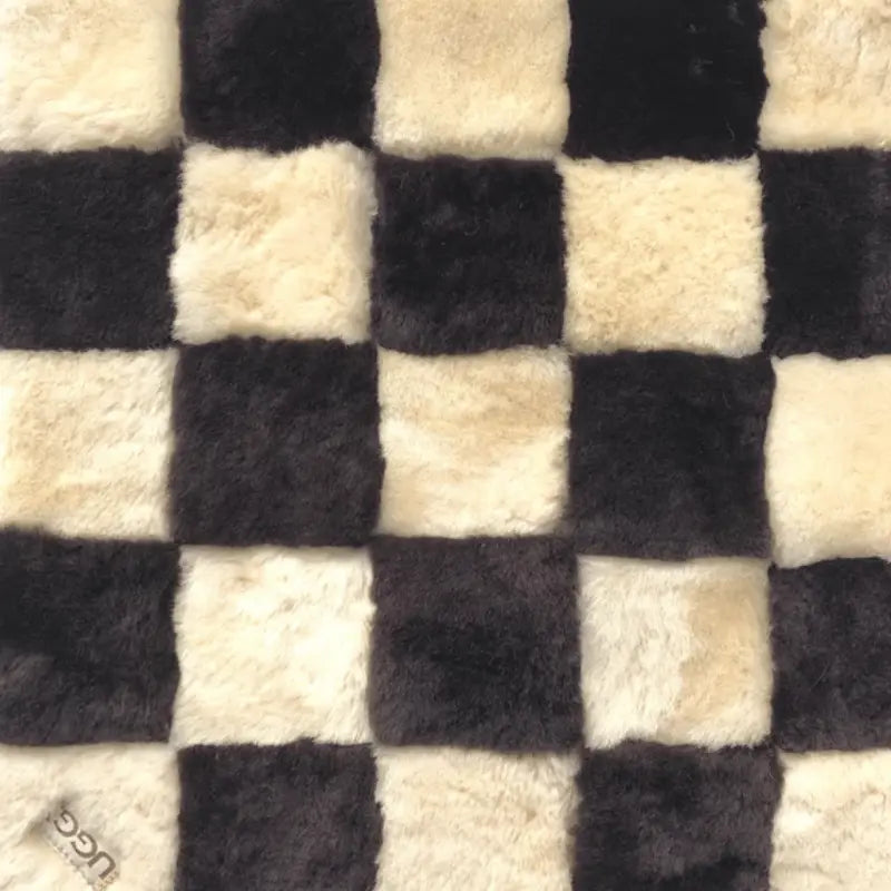 Picture of a checkerboard sheepskin mat made in Australia.
