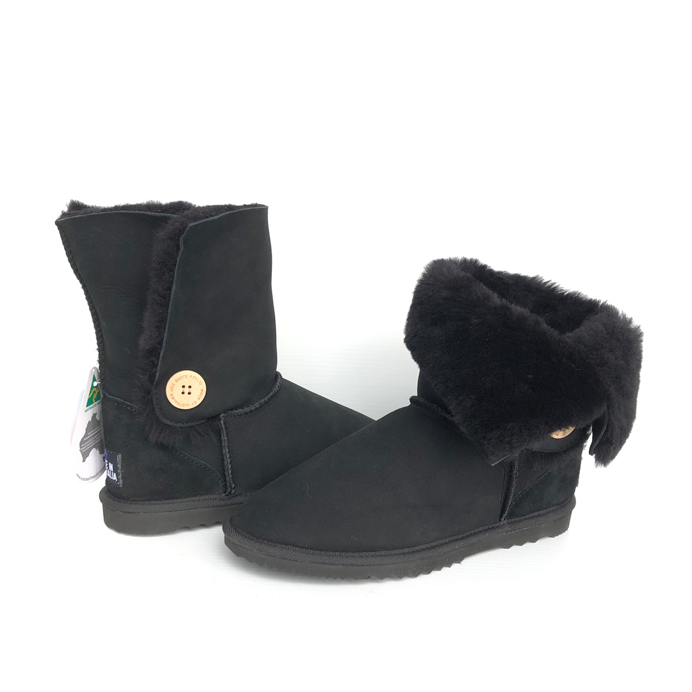 Short black ugg boots with side button and black sheepskin spillage from the top