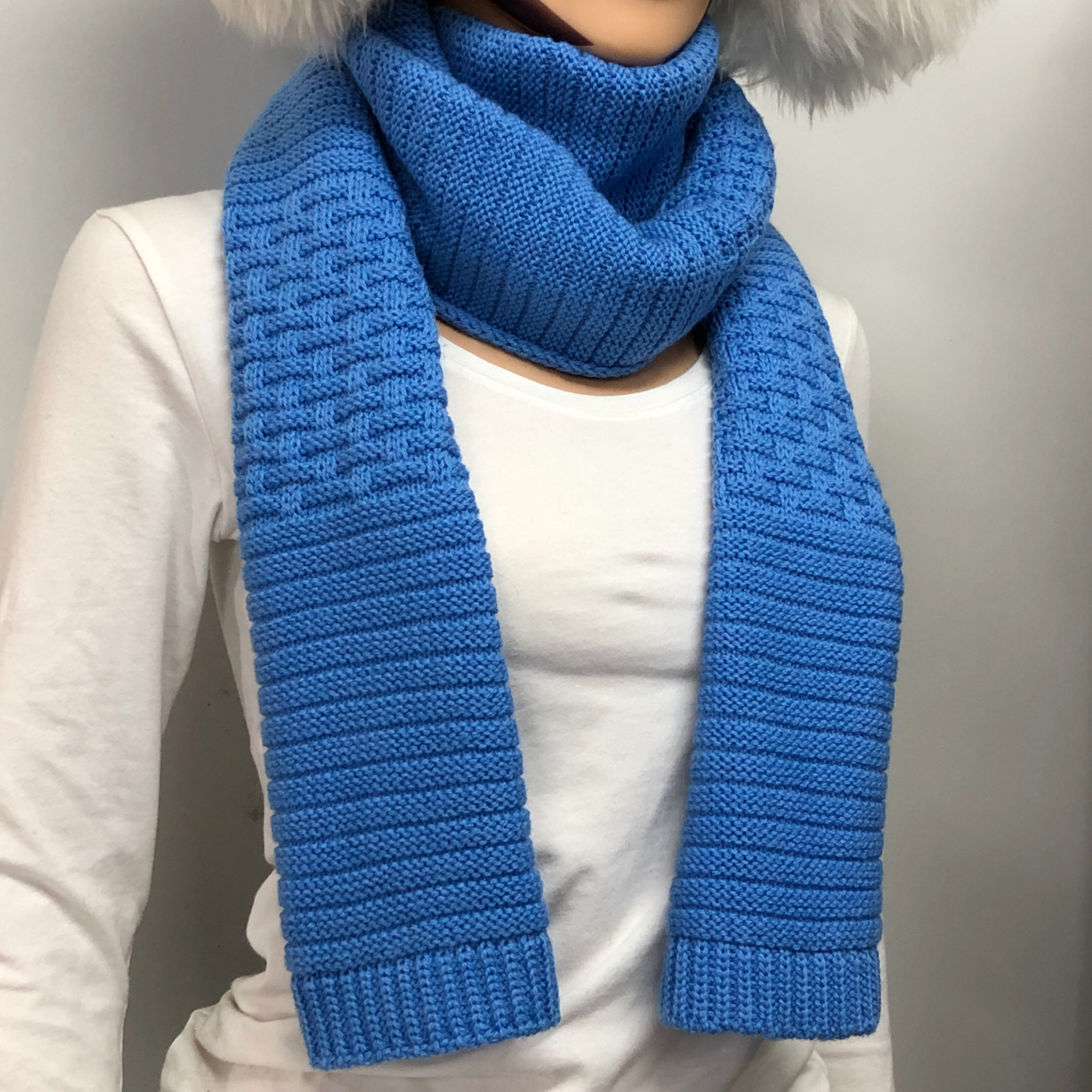 Blue Merino woolen scarf on a female dummy