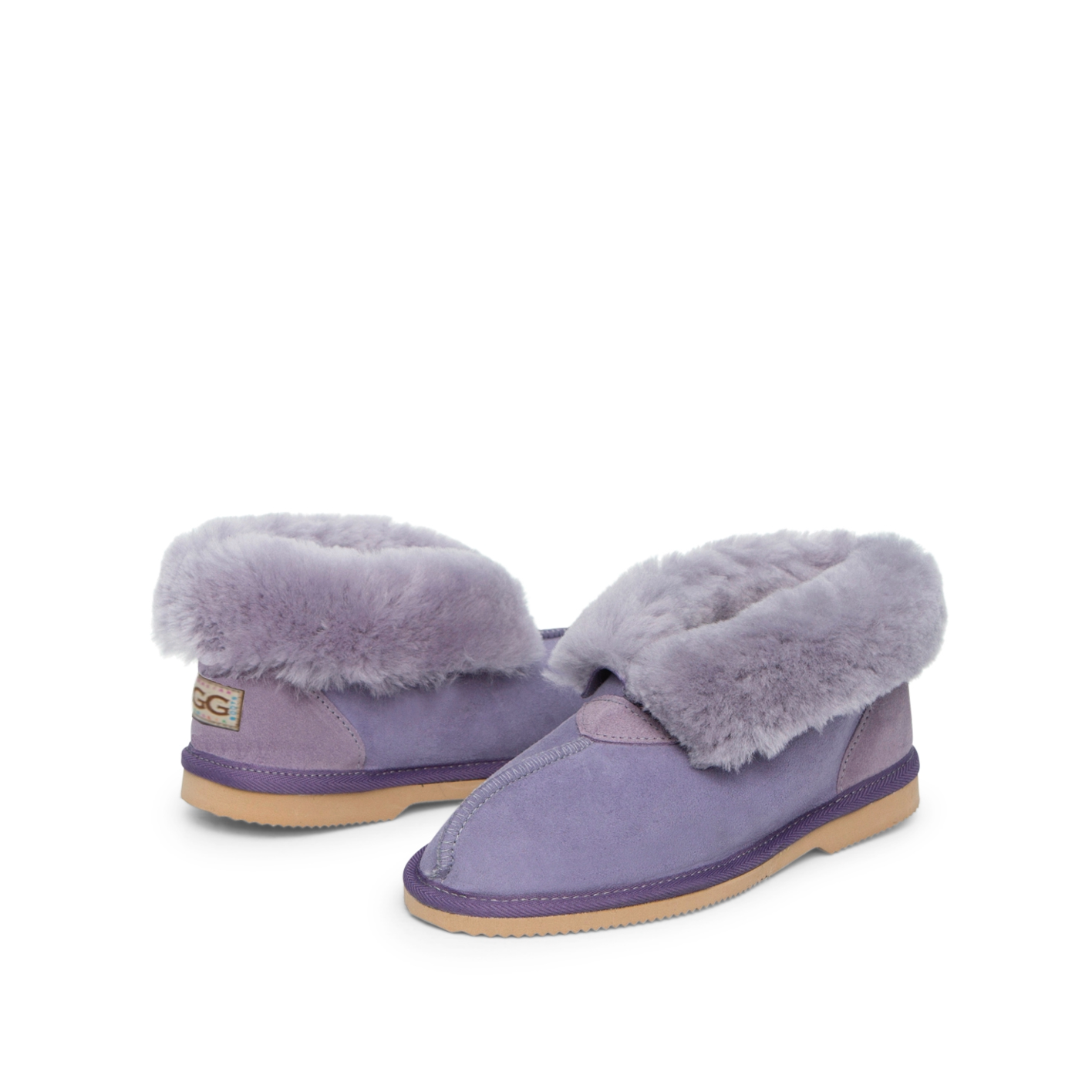 Kid's Ugg Slippers, with sheepskin rolled out at the top in Lilac