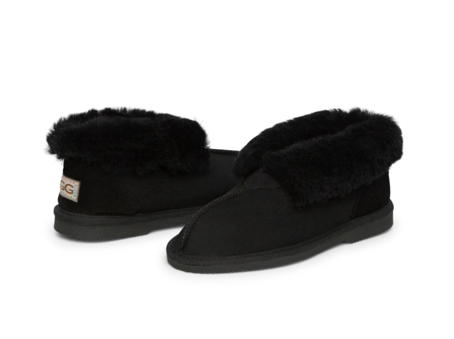 Kid's Ugg Slippers, with sheepskin rolled out at the top in black