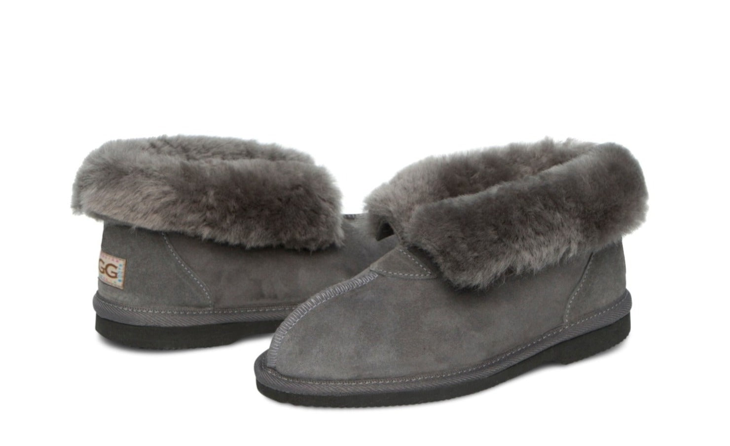 Kid's Ugg Slippers, with sheepskin rolled out at the top in grey